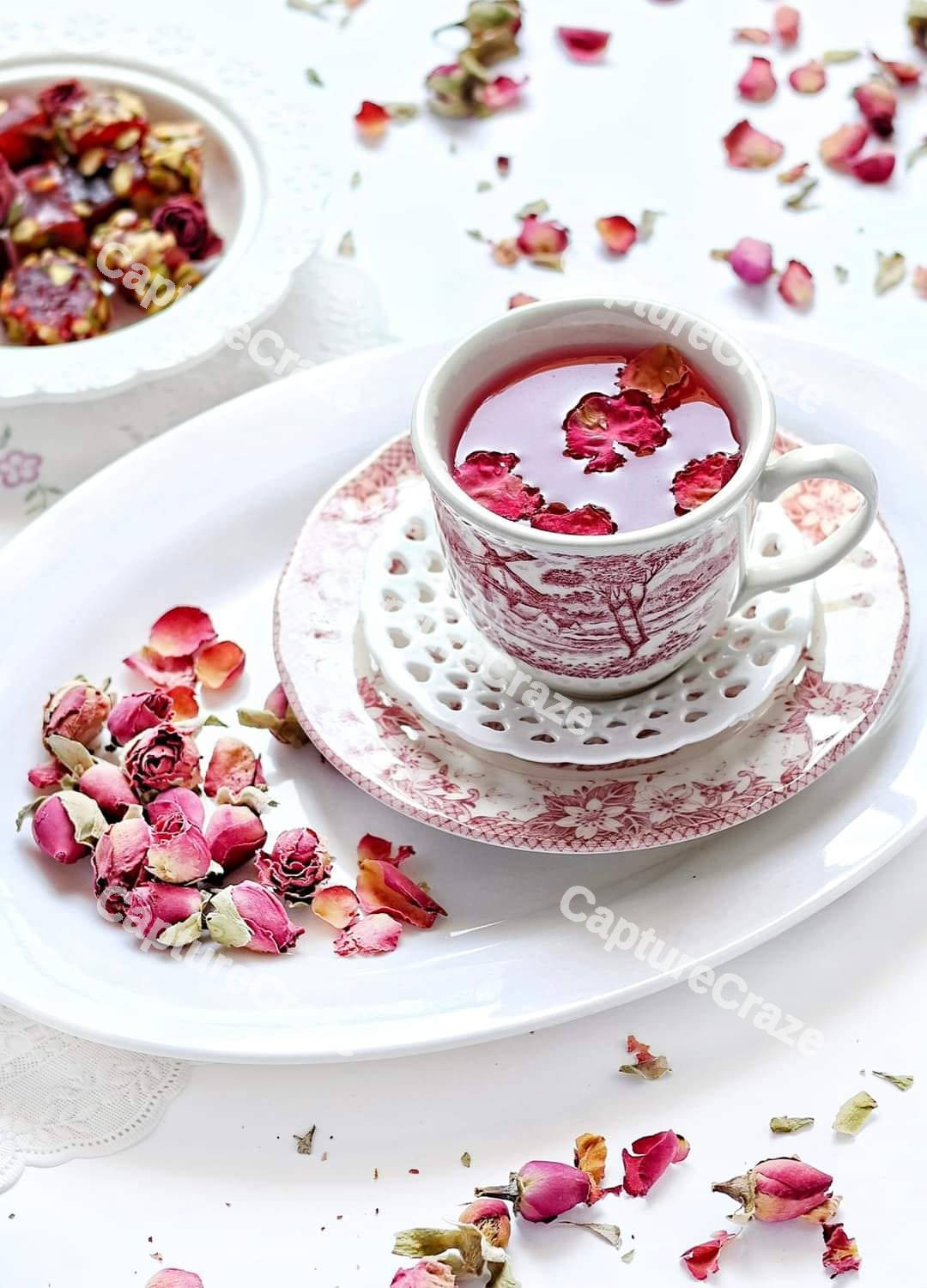 Flowers inside a tea cup